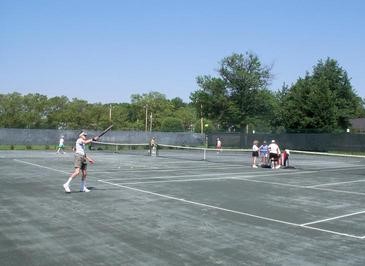 group playing tennis